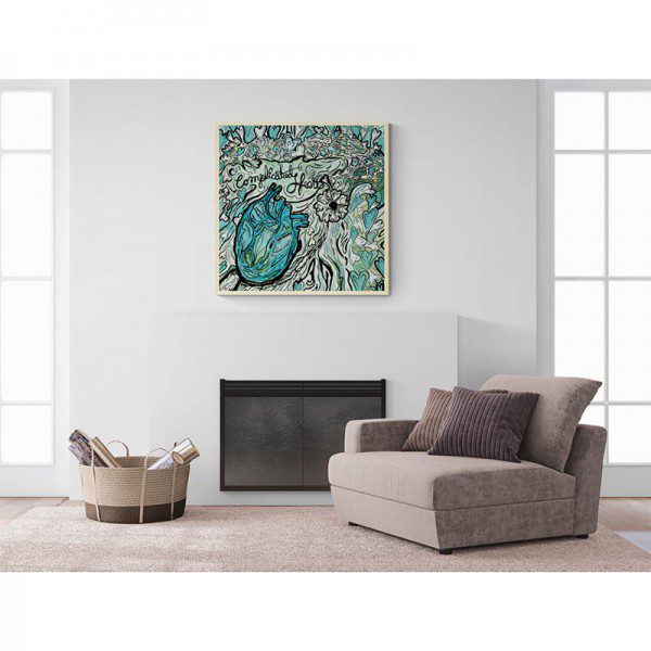 An Complicated Heart Framed Print hangs above a fireplace in a living room.