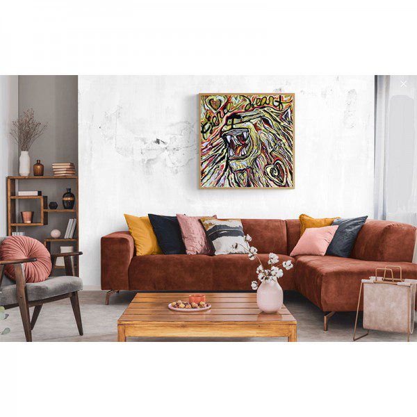A living room with a Fierce Heart painting on the wall.