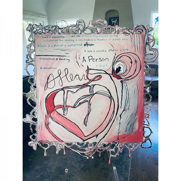 A frame with A Heart drawing on it.