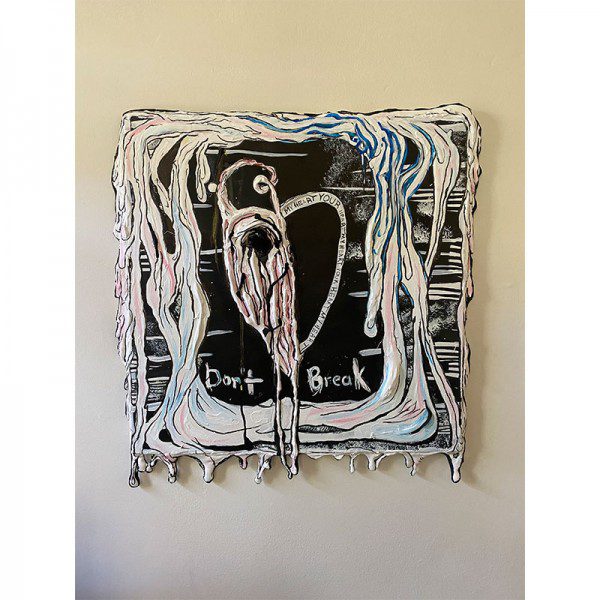 A black and white painting of Don’t Break My Heart on a wall.