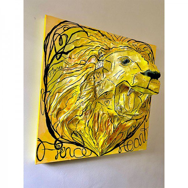 A yellow lion on a wall.