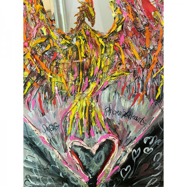 A painting of a phoenix with a Heavy Heart on it.