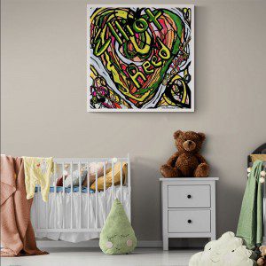 A baby's room with a teddy bear and an Infinity Heart Framed Print Custom Print With Baby Name on the wall.