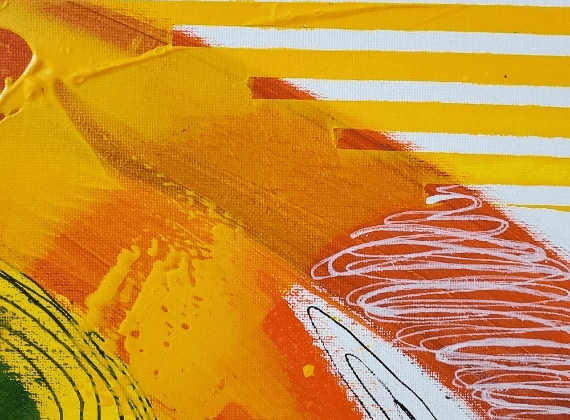 A close up of the painting 's yellow and orange colors.