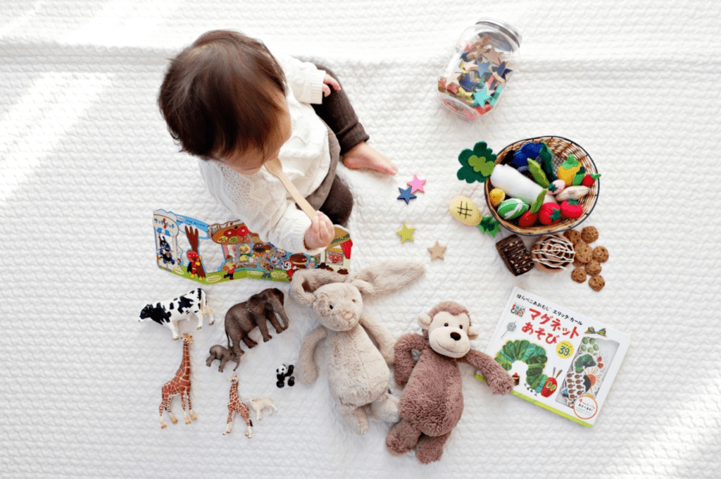 A baby playing with toys