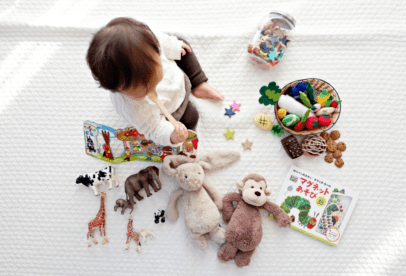A child playing with toys on the floor